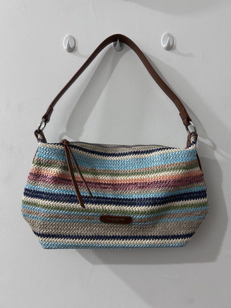 David Jones Multi-colored Striped Woven Shoulder Bag (Category: Shoulder Bags) located in Pasay City. Submitted by iaedd (Listing ID 1466016065, Image 1). Description: - USED ONCE ONLY, ORIGINALLY BOUGHT FOR 800+ - Brand: David Jones - Style: Shoulder bag with top zip closure - Material: Multi-colored striped straw weave with durable beige bottom panels - Accents: Brown leather-look handle and zipper pull tabs - Perfect for casual outings and sum