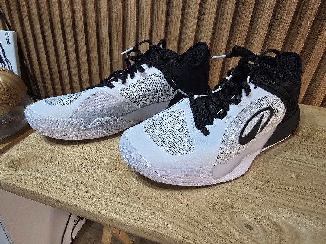 Decathlon Tennis Shoes (Category: Casual Shoes) located in Quezon City. Submitted by allthingsgoode_men (Listing ID 1466107930, Image 3). Description: - Color: Classic black and white - Upper: Breathable mesh for maximum airflow - Outsole: Durable rubber with textured grip for traction - Support: Padded collar for extra ankle support - Use: Ideal for tennis, pickleball, any racket sport - Details: Clean white midsoles with contrast branding RFS: 