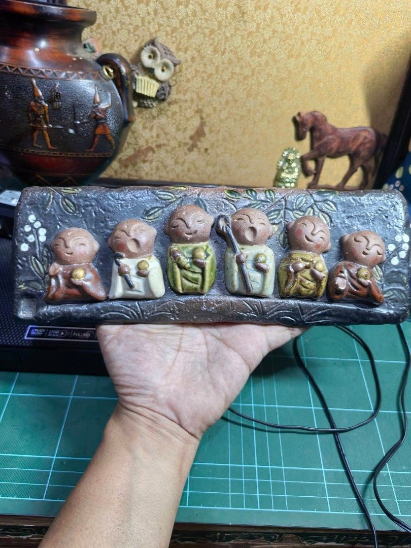 Decorative Plaque Figurine - 6 Monks (Category: Other Home Decor) located in Cebu City. Submitted by dudes_villanueva (Listing ID 1466108294, Image 1). Description: Decorative Plaque Figurine - 6 Monks Material : Stoneware 📌 Six smiling young monks or Jizo figures seated in a row. 📌 Each of the six figures corresponds to a specific spiritual realm of rebirth in Buddhist cosmology. Jizo Bosatsu vowed to manifest himself in all six areas to prote