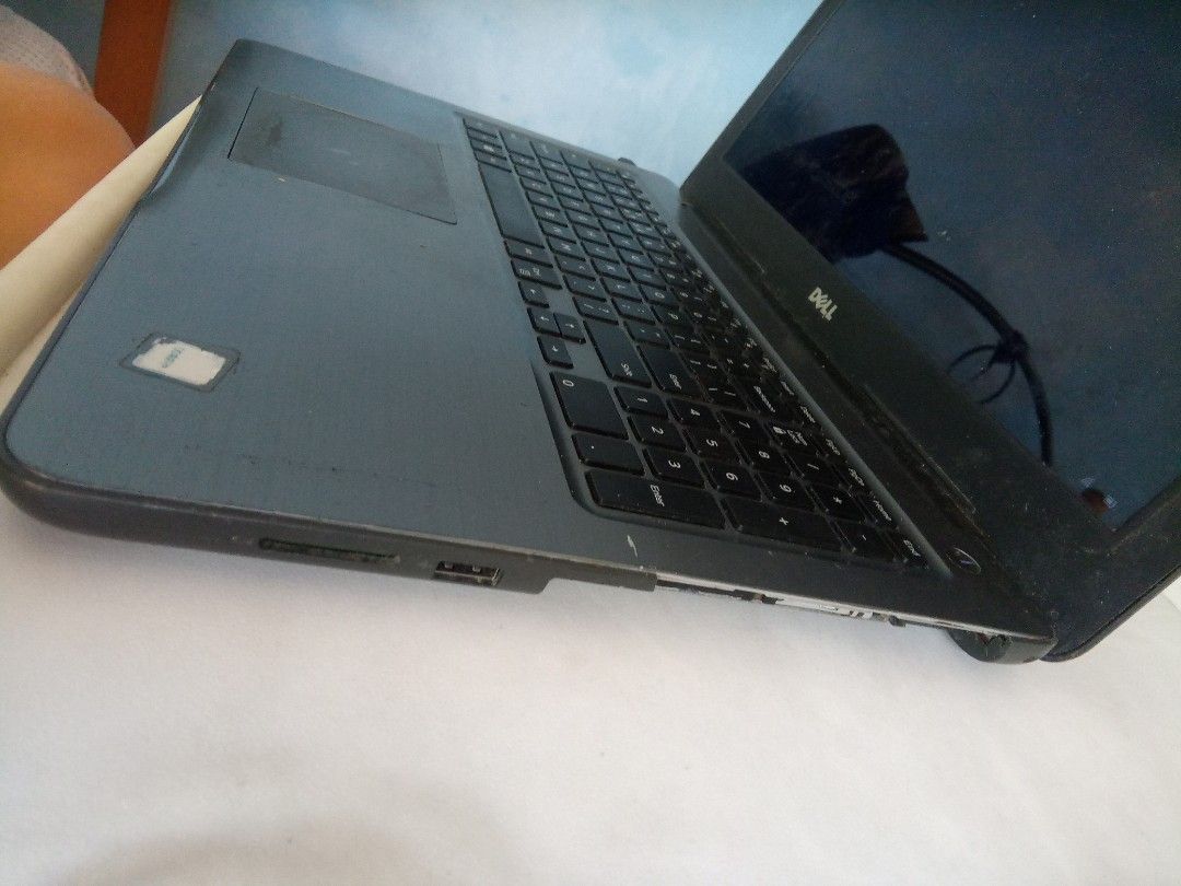 Dell Windows (Category: Laptops & Notebooks) located in Quezon City. Submitted by c_villegas15 (Listing ID 1466152592, Image 2). Description: - Brand: Dell Inspiron 5567 - OS: Windows 10 - i3 7th gen Processor - Keyboard: QWERTY with full numeric keypad (No ghost Touch) - Color: Dark grey - Included: Power adapter and charging brick - Condition: Working with active desktop display - Defect: Battery Defective, laptop needs to be plugged (Charger i