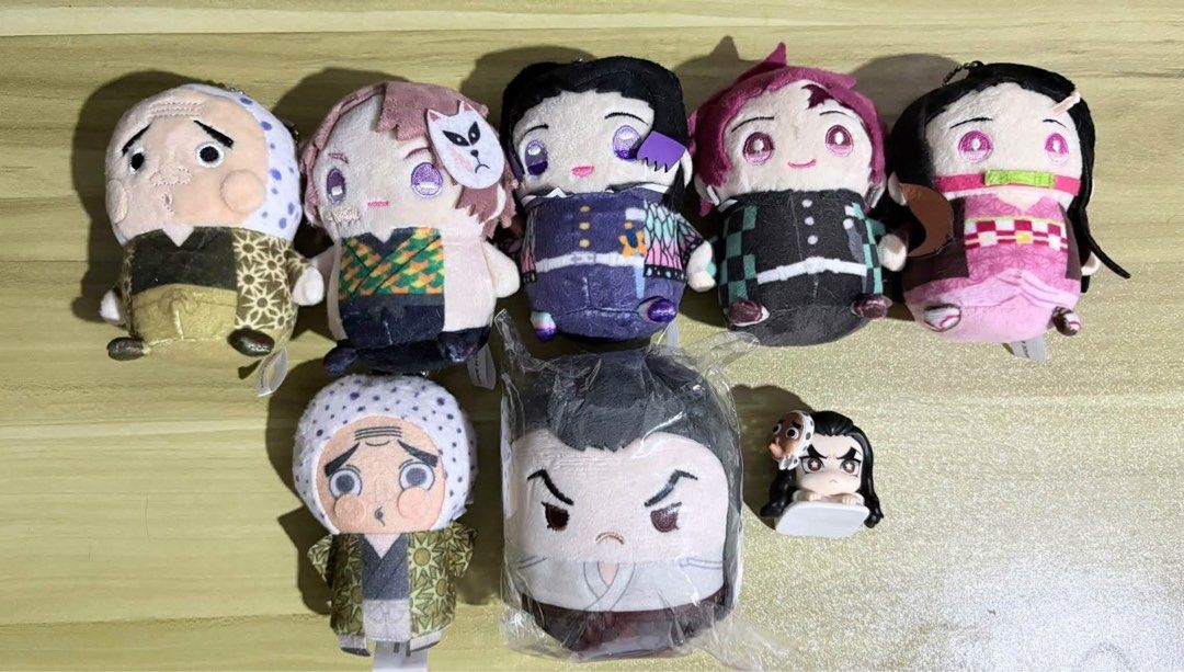 Demon Slayer plush toys (Category: Plushies & Soft Toys) located in Valenzuela. Submitted by lulubellex (Listing ID 1466149572, Image 1). Description: Demon Slayer plush set - 1500 IF tingi 250 | 300 | ❌ shinobu | 200| 200 200| 300 | 160.