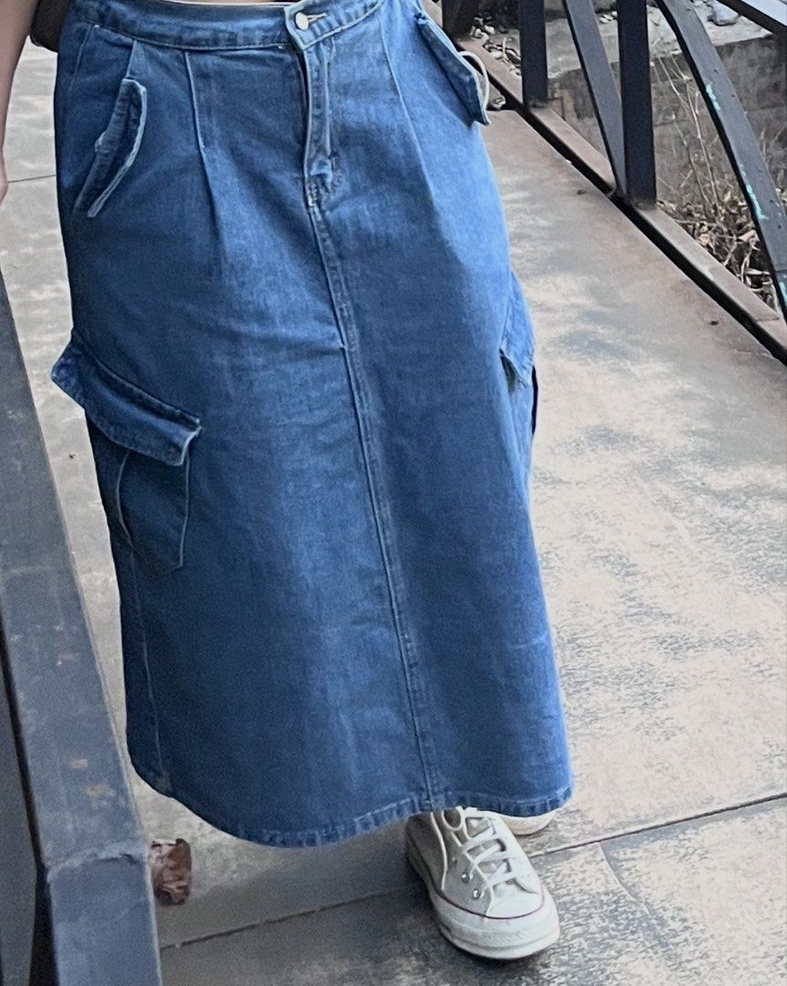 Denim Cargo Maxi Skirt (Category: Skirts) located in Quezon City. Submitted by jreesey (Listing ID 1465997678, Image 1). Description: Blue denim cargo maxi skirt / long skirt - features four pockets (pockets above are quite large) - Quite heavyweight - W: 30-33” | L: 32.5” - purchased on this app in 2024 Payment Method Options: BDO Pay, GCash, Maribank RFS: Decluttering More photos available upon request.