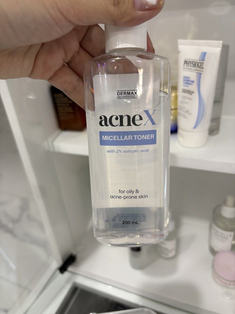 Dermax Professional AcneX Micellar Toner 200ml (Category: Face Care) located in Manila. Submitted by monstershaaa (Listing ID 1466124408, Image 1). Description: - Brand: Dermax Professional - Product: AcneX Micellar Toner - Size: Large 200ml bottle - Key Ingredient: 2% Salicylic Acid - Skin Type: Formulated specifically for oily and acne-prone skin - Benefits: Clears up breakouts and removes excess oil - Packaging: Clear liquid formula in a trans