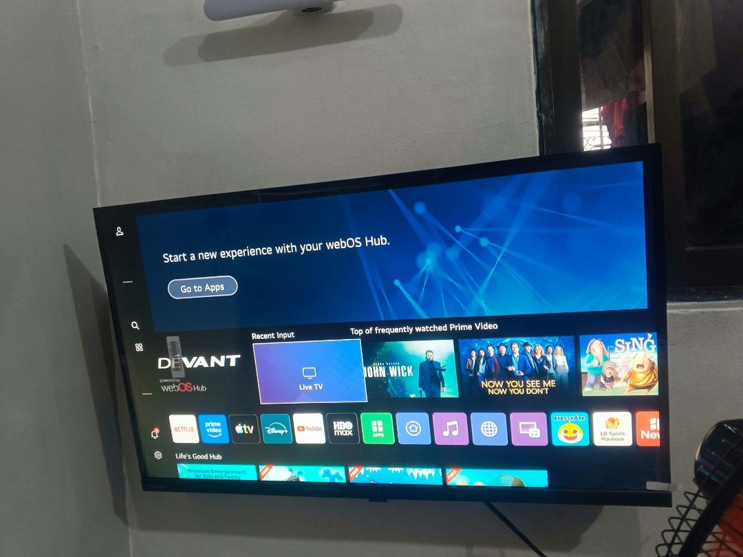 Devant Smart TV powered by webOS Hub (Category: TV) located in Pasig City. Submitted by sandysexy (Listing ID 1466040773, Image 3). Description: - Brand: Devant Flat Screen TV - Smart Platform: webOS Hub interface - Built-in Apps: Netflix, Prime Video, Apple TV, Disney+, YouTube, HBO Max - Features: Live TV input and clean display with thin bezels - Condition: Tested and working great.