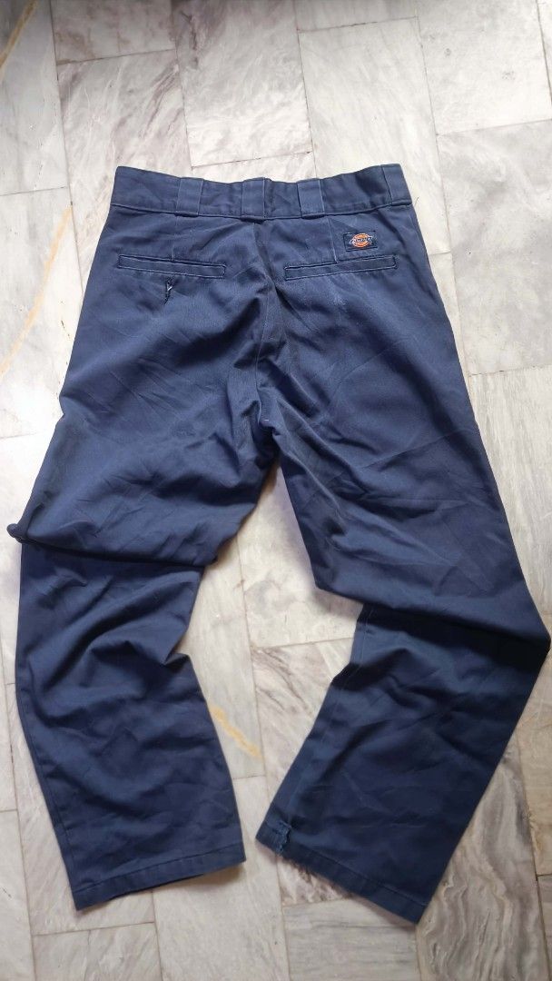 Dickies 874 Original Fit Work Pants Navy (Category: Trousers) located in Manila. Submitted by boot_tdm (Listing ID 1466154072, Image 2). Description: - Brand: Dickies - Model: 874 Original Fit Work Pants - Color: Navy Blue - Size: Tagged size 30 - Fit: Classic straight leg with belt loops and button closure - Details: Signature Dickies logo patch on the back right pocket - Material: Sturdy, durable twill fabric built to last.