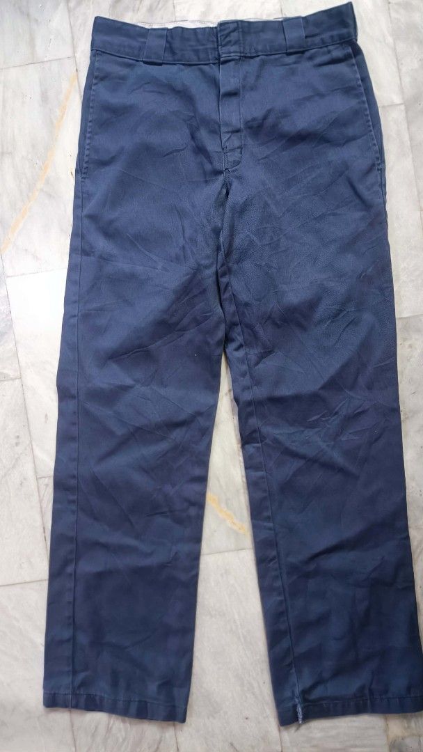 Dickies 874 Original Fit Work Pants Navy (Category: Trousers) located in Manila. Submitted by boot_tdm (Listing ID 1466154072, Image 1). Description: - Brand: Dickies - Model: 874 Original Fit Work Pants - Color: Navy Blue - Size: Tagged size 30 - Fit: Classic straight leg with belt loops and button closure - Details: Signature Dickies logo patch on the back right pocket - Material: Sturdy, durable twill fabric built to last.