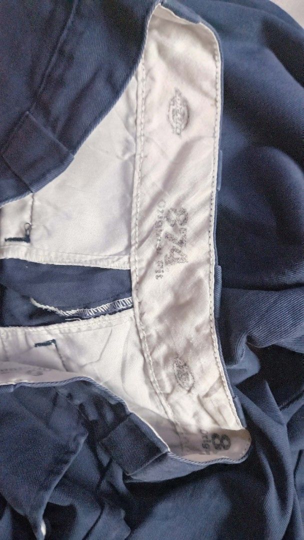 Dickies 874 Original Fit Work Pants Navy (Category: Trousers) located in Manila. Submitted by boot_tdm (Listing ID 1466154072, Image 3). Description: - Brand: Dickies - Model: 874 Original Fit Work Pants - Color: Navy Blue - Size: Tagged size 30 - Fit: Classic straight leg with belt loops and button closure - Details: Signature Dickies logo patch on the back right pocket - Material: Sturdy, durable twill fabric built to last.