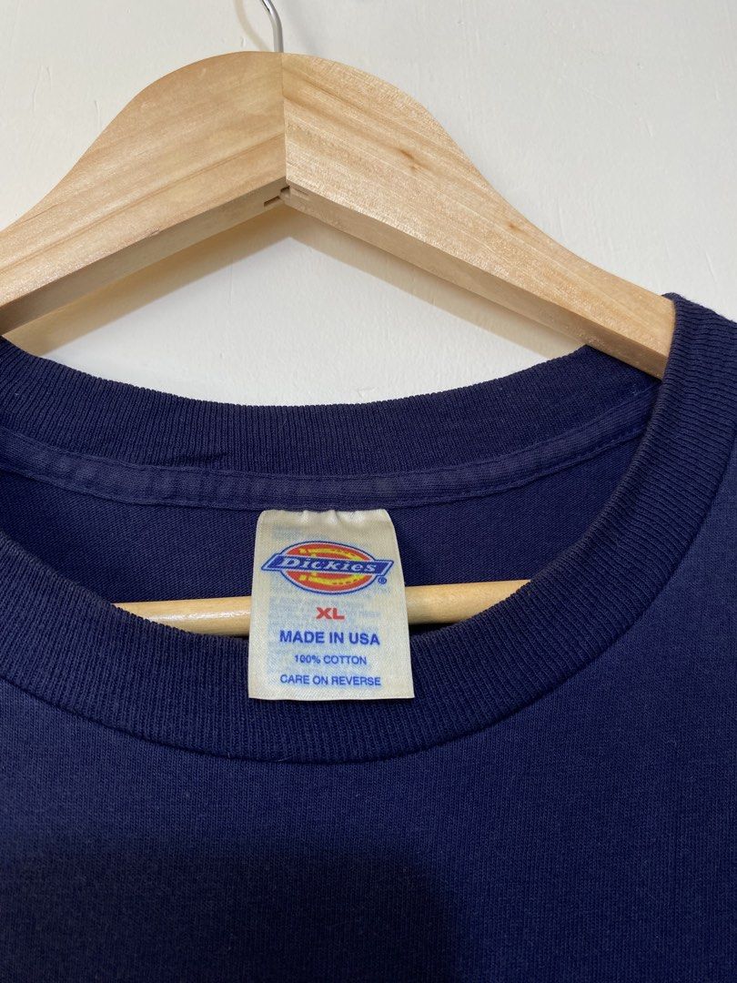DICKIES,Pocket tee t-shirt (Category: Tshirts & Polo Shirts ) located in Cavite. Submitted by jc_thrift95 (Listing ID 1466099707, Image 3). Description: - navy blue Dickies short-sleeve pocket T-shirt with a crew neck and a small Dickies logo patch near the bottom hem. - Made in USA - L- 31 inch - W- 24 inch - Color rate 8/10 - See pictures details for dimes..