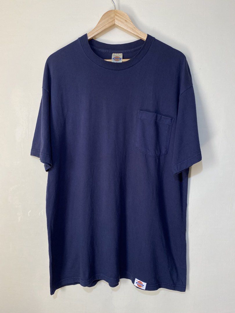DICKIES,Pocket tee t-shirt (Category: Tshirts & Polo Shirts ) located in Cavite. Submitted by jc_thrift95 (Listing ID 1466099707, Image 1). Description: - navy blue Dickies short-sleeve pocket T-shirt with a crew neck and a small Dickies logo patch near the bottom hem. - Made in USA - L- 31 inch - W- 24 inch - Color rate 8/10 - See pictures details for dimes..