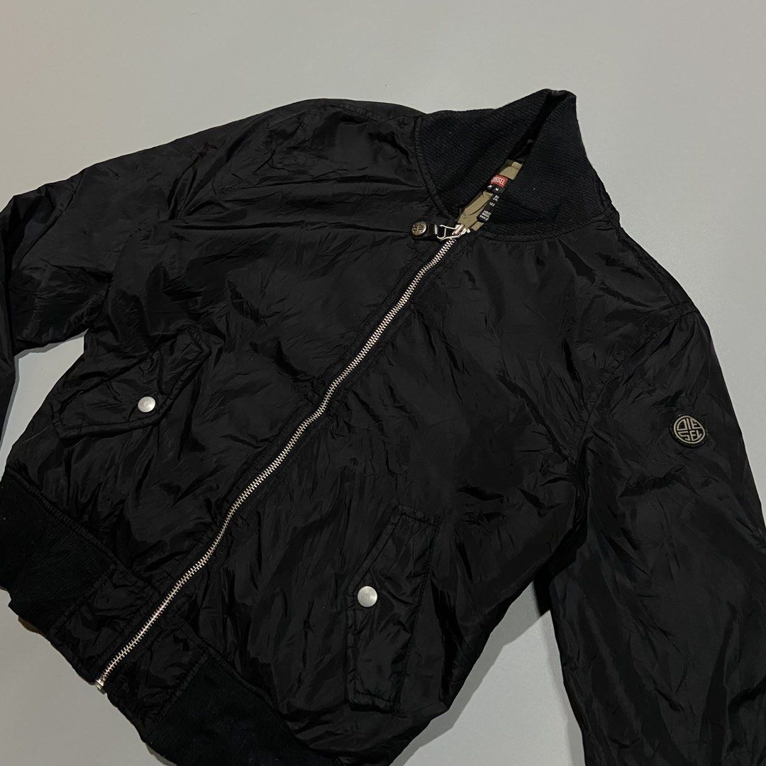 Diesel Bomber Jacket Nylon Womens (Category: Coats, Jackets and Outerwear) located in Cebu City. Submitted by johngregmoldez03 (Listing ID 1466060277, Image 2). Description: Diesel Bomber Jacket Nylon Womens Size: Medium Dimension: 20 Width / 22 Length Color Rate: 10/10 Very Good Condition - Need Wash Honest issue only last picture armpit fade stain Pm📩.