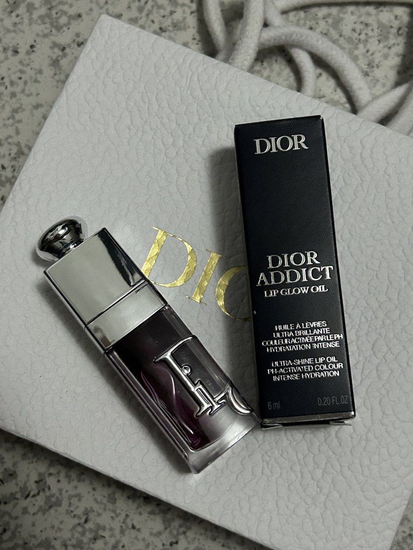 Dior Addict Lip Glow Oil 6ml (Category: Makeup) located in Manila. Submitted by zafhiera_ (Listing ID 1466120465, Image 1). Description: - Item: Dior Addict Lip Glow Oil - Shade: 006 - Size: 6ml - Condition: na use lang for swatch - Expiry Date: February 2029 - Features: Ultra-shine, intense hydration, and pH-activated custom colour *MINIMAL ISSUE* -have my name on it🥹 ORIGINAL PRICE- 2.6k SELLING PRICE 2.2k it comes with paper bag na Bought thi