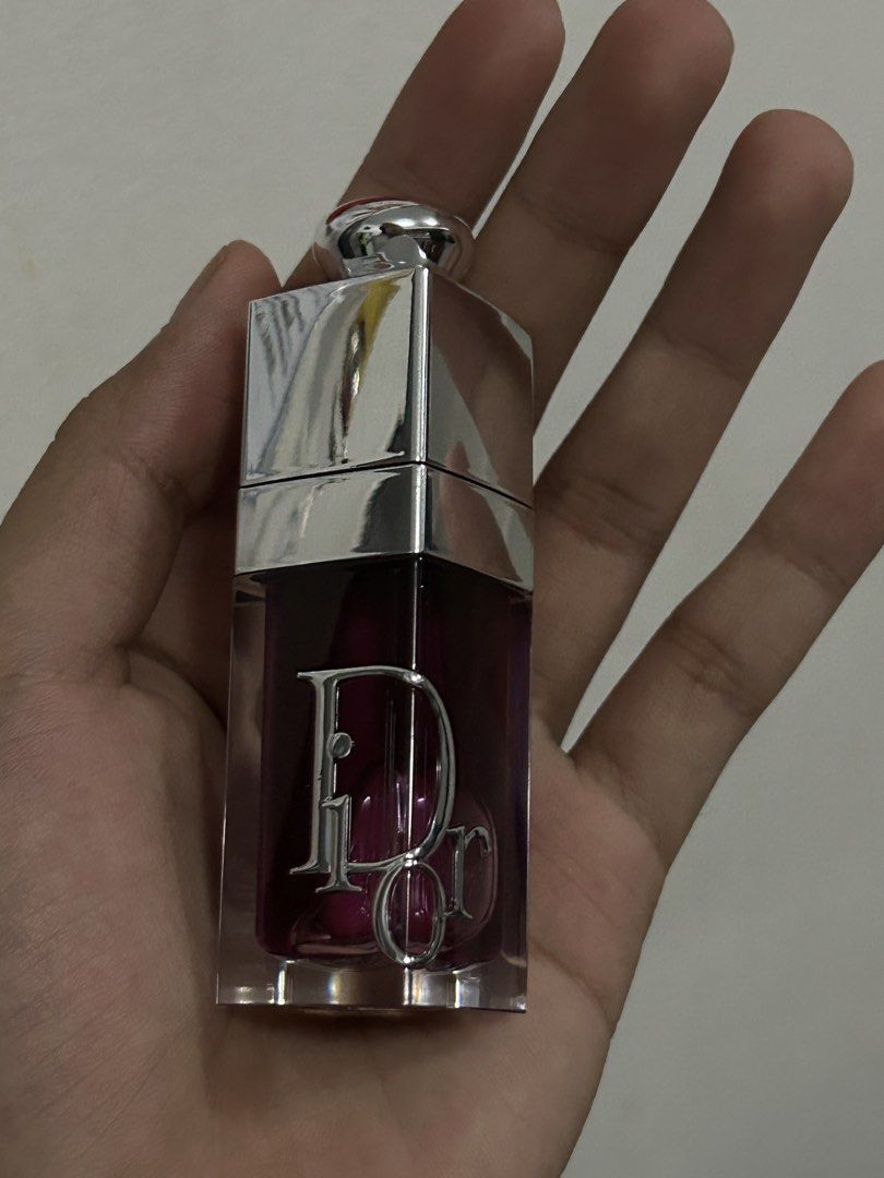 Dior Addict Lip Glow Oil 6ml (Category: Makeup) located in Manila. Submitted by zafhiera_ (Listing ID 1466120465, Image 3). Description: - Item: Dior Addict Lip Glow Oil - Shade: 006 - Size: 6ml - Condition: na use lang for swatch - Expiry Date: February 2029 - Features: Ultra-shine, intense hydration, and pH-activated custom colour *MINIMAL ISSUE* -have my name on it🥹 ORIGINAL PRICE- 2.6k SELLING PRICE 2.2k it comes with paper bag na Bought thi