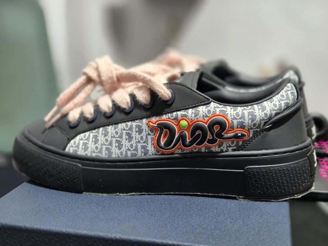 Dior B33 Kaws Sneakers (Category: Sneakers) located in Manila. Submitted by Metronome (Listing ID 1465971719, Image 1). Description: STEAL!!! DIOR B33 x KAWS collab Limited Numbered Edition (#848 out of 1947 pairs worldwide) sneaker (NAVY BLUE) Bought in Osaka Japan, Dior Shinsaibashi store - Almost new (VNDS), 9.8/10 - Used only for 4-5 hrs inside mall - with Sole Sheild, to maintain the sole in new condition - Size : 10 (can fit 11.5-12 US ) - 