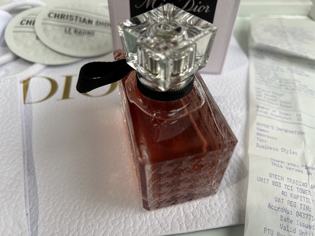 Dior Essence Perfume (Category: Luxury Accessories) located in Manila. Submitted by goldpalace.ph (Listing ID 1466042667, Image 2). Description: Dior perfume for sale ✨ Purchased on August 20, 2026, at the Dior branch in SM Aura. Receipt is available as proof of purchase. Only 6 sprays used — still practically full and well-kept. With free dior beauty smartphone mirror set and Le Baume. 📍Taguig City 13,500 Fixed price.