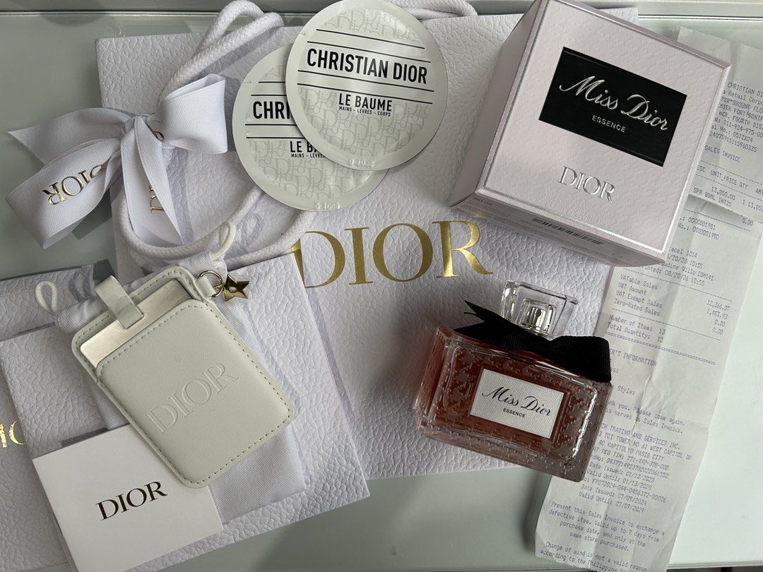 Dior Essence Perfume (Category: Luxury Accessories) located in Manila. Submitted by goldpalace.ph (Listing ID 1466042667, Image 1). Description: Dior perfume for sale ✨ Purchased on August 20, 2026, at the Dior branch in SM Aura. Receipt is available as proof of purchase. Only 6 sprays used — still practically full and well-kept. With free dior beauty smartphone mirror set and Le Baume. 📍Taguig City 13,500 Fixed price.