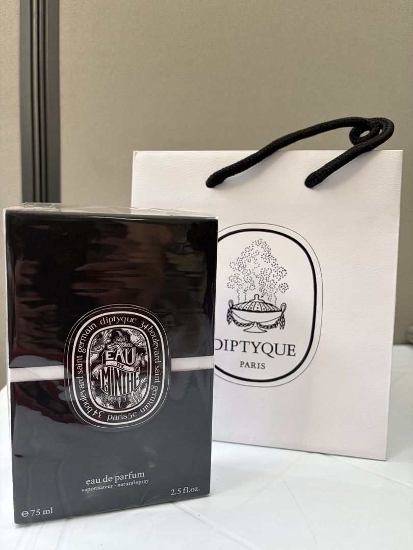 Diptyque Eau de Minthe Eau de Parfum 75ml (Category: Fragrance & Deodorants) located in Cebu City. Submitted by boldcat-4f6b (Listing ID 1465972402, Image 1). Description: - Brand: Diptyque - Fragrance: Eau de Minthe (Eau de Parfum) - Size: 75ml - Condition: Brand new, factory sealed in original plastic wrap - Inclusions: Matching Diptyque boutique paper gift bag - Details: Fresh mint scent profile, authentic packaging with clear barcode and batc