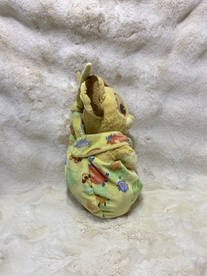 Disney Babies’ The Lion King “Simba” plush (Category: Plushies & Soft Toys) located in Kalibo. Submitted by ollie_stuffshop (Listing ID 1465959848, Image 2). Description: 28cm x 19cm Before you send your inquiries: ❗️Last Price is already posted ❗️Manage your expectations, WYSIWYG ❗️May need washing ❗️Dropoff is every Wednesday & Sunday - Baby Simba doll tucked inside a matching patterned blanket pouch..