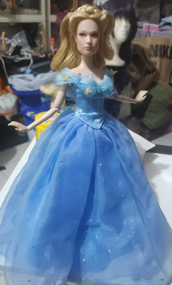 Disney Live Action Cinderella Doll (Category: Kids Toys) located in Manila. Submitted by shivvers.cos107 (Listing ID 1466134335, Image 1). Description: Disney Live Action Cinderella doll for 2k 💙. Originally bought for a higher price. RFS: Impulse buy 💙 details: — Like new. — No cracked neck. — Tight joints. — with shoes. — Uncut hair. MOP: GCASH MOD: LALAMOVE/J&T LOC: SAMPALOC, MANILA.