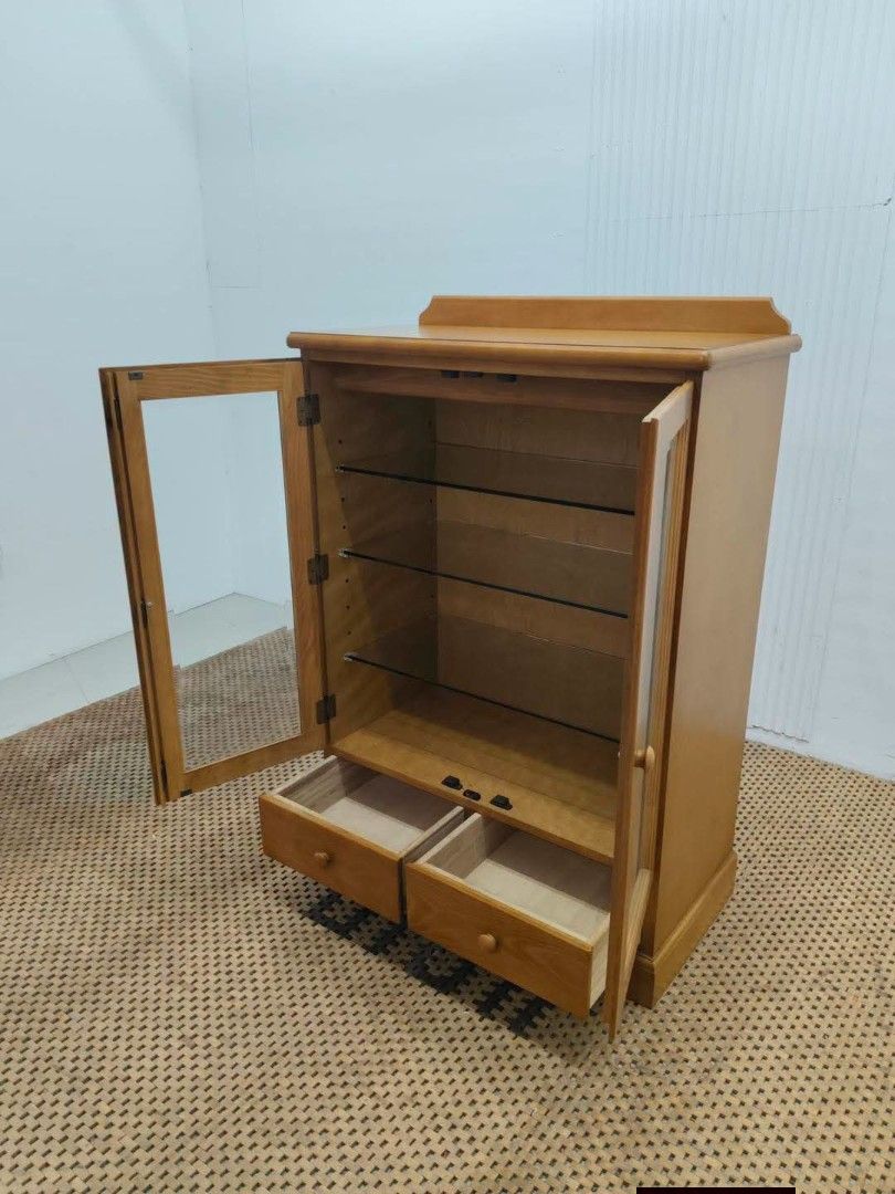 Display Cabinet (Category: Shelves, Cabinets & Racks) located in Meycauayan. Submitted by marygracecasimiro (Listing ID 1465960697, Image 3). Description: Classic Wooden 2-Door Glass Display Cabinet with 2 Drawers Price: 8,900 Sale:6,900 L33 x W17 x H45.5 In good condition💚/🩷.