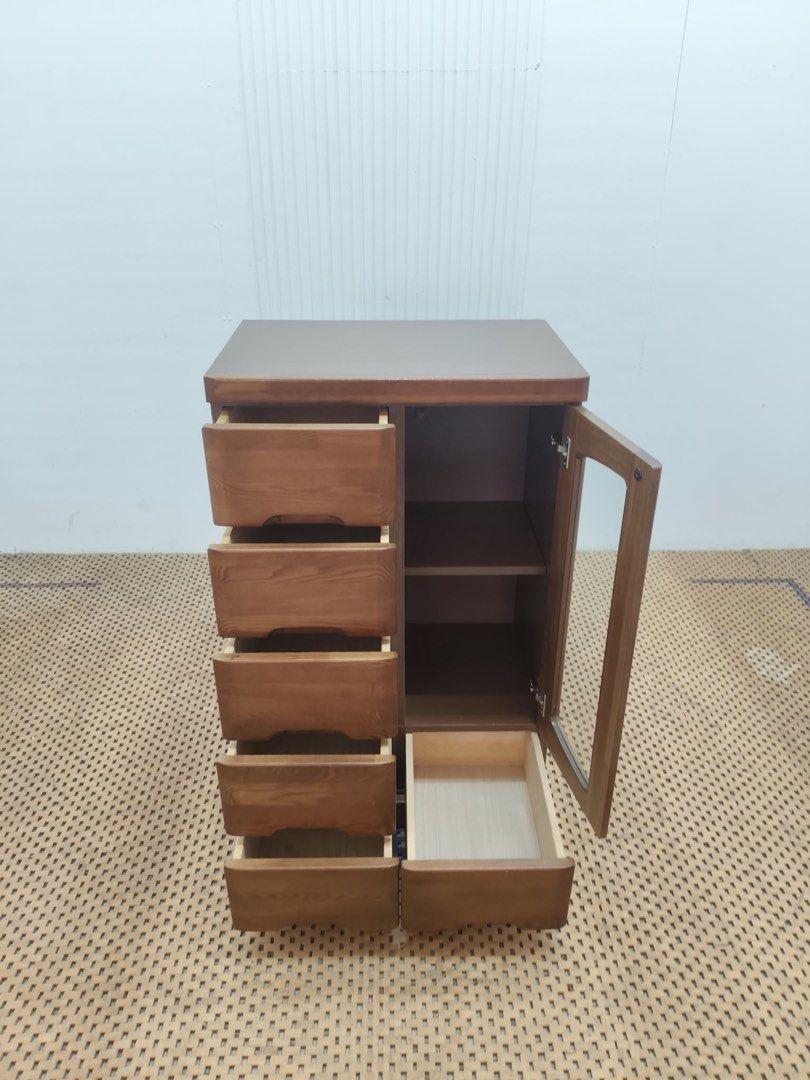 Display Cabinet (Category: Shelves, Cabinets & Racks) located in Quezon City. Submitted by matetdevis13 (Listing ID 1466082991, Image 3). Description: Compact 6-Tier Drawer and 1 Glass Door Chest Price: 4,900 L23 x W16 x H37 In good condition Code JMD15-MJ389.