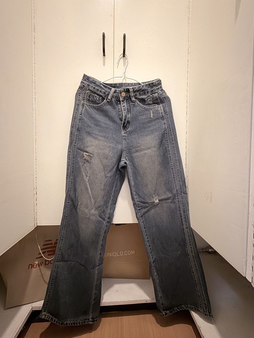 Distressed Straight Leg Denim Jeans (Category: Jeans) located in Pasay City. Submitted by notellyyyy (Listing ID 1465990889, Image 1). Description: - Classic blue denim jeans with a stylish vintage wash - Flattering straight leg cut with trendy front distressed details - Unique double-stitched vertical seams running down both legs - Practical standard five-pocket design including back pockets - Comfortable mid-rise waist with secure button closur