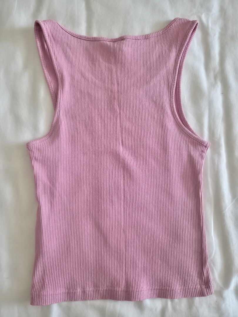 Divided H&M Basic Pink Ribbed Tank Top (Category: Sleeveless) located in Quezon City. Submitted by corrnic (Listing ID 1466027195, Image 3). Description: - Brand: Divided H&M Basic - Color: Pink - Size: S (fits true to size, great stretch) - Style: Sleeveless, scoop neckline, form-fitting, hip length - Condition: Clean, no flaws found - Perfect everyday basic top, easy to style with shorts or jeans.