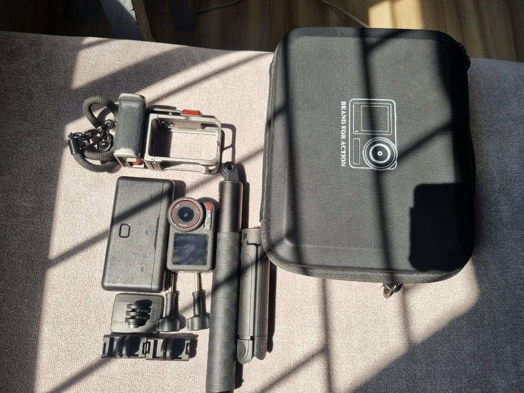 DJI Osmo Action 5 Pro Bundle with Accessories and Case (Category: Cameras) located in Quezon City. Submitted by oilnamgamumsh (Listing ID 1466082966, Image 1). Description: - DJI Osmo Action 5 Pro ADVENTURE COMBO vlogging and action bundle - Charging case with three 1950mAh batteries for extended shooting - Includes extension rod and UURIG TP-05 mini tripod - Comes with protective frame case, lanyard, mounts, and thumbscrews - Includes a large st