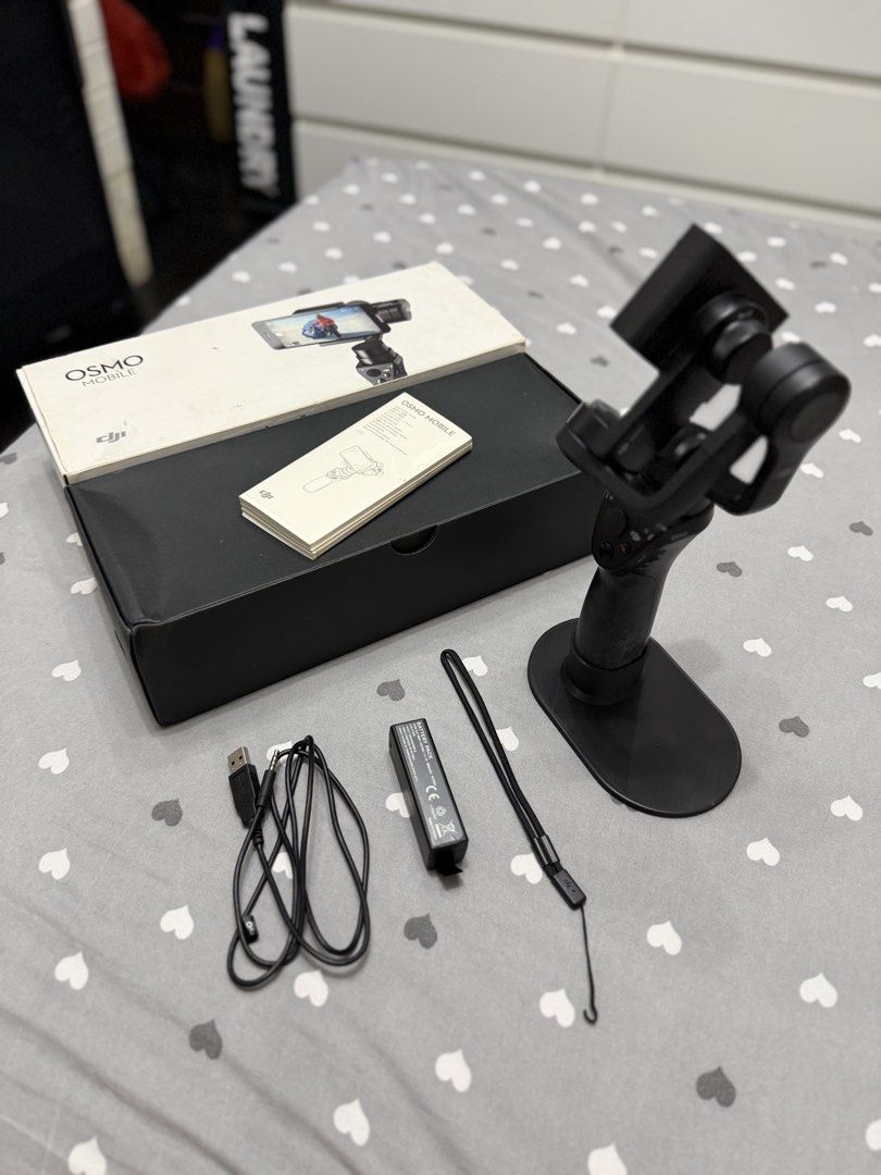 DJI OSMO Mobile Gimbal Stabilizer with stand (Category: Gimbals & Stabilizers ) located in Taytay. Submitted by mipreluxe2 (Listing ID 1465962718, Image 2). Description: DJI OSMO Mobile Gimbal Stabilizer In very good condition Comes with stand With receipt.