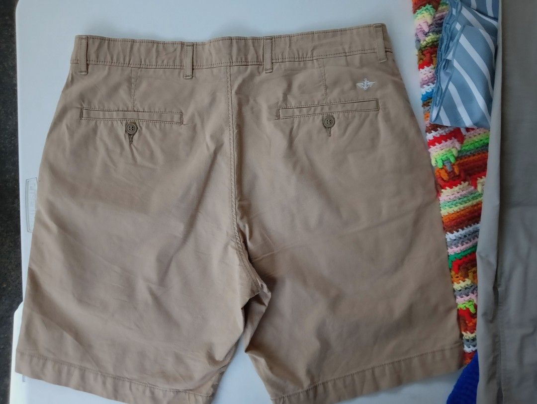 Dockers Short (Category: Shorts) located in Rizal. Submitted by timeless_shop (Listing ID 1466006183, Image 2). Description: Dockers Men's Short - Khaki / Beige - Original! ✨ 📏 Length 20 inches 📐 Width 18 inches flat laid 👖 Waist Fit 35-36 inches 🧵 Klase ng Tela: - Chino / Twill fabric - makapal, matibay! - 100% Cotton - presko, hindi mainit! - Stretch waist - comfy! 💯 Good Condition 9.9/10 ✨ - Like New! 🎨 Color Rate 9.9/10 - Khaki na Khaki