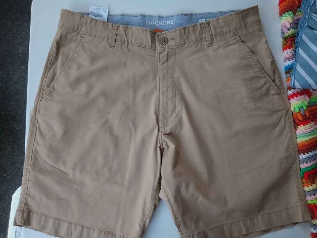 Dockers Short (Category: Shorts) located in Rizal. Submitted by timeless_shop (Listing ID 1466006183, Image 1). Description: Dockers Men's Short - Khaki / Beige - Original! ✨ 📏 Length 20 inches 📐 Width 18 inches flat laid 👖 Waist Fit 35-36 inches 🧵 Klase ng Tela: - Chino / Twill fabric - makapal, matibay! - 100% Cotton - presko, hindi mainit! - Stretch waist - comfy! 💯 Good Condition 9.9/10 ✨ - Like New! 🎨 Color Rate 9.9/10 - Khaki na Khaki