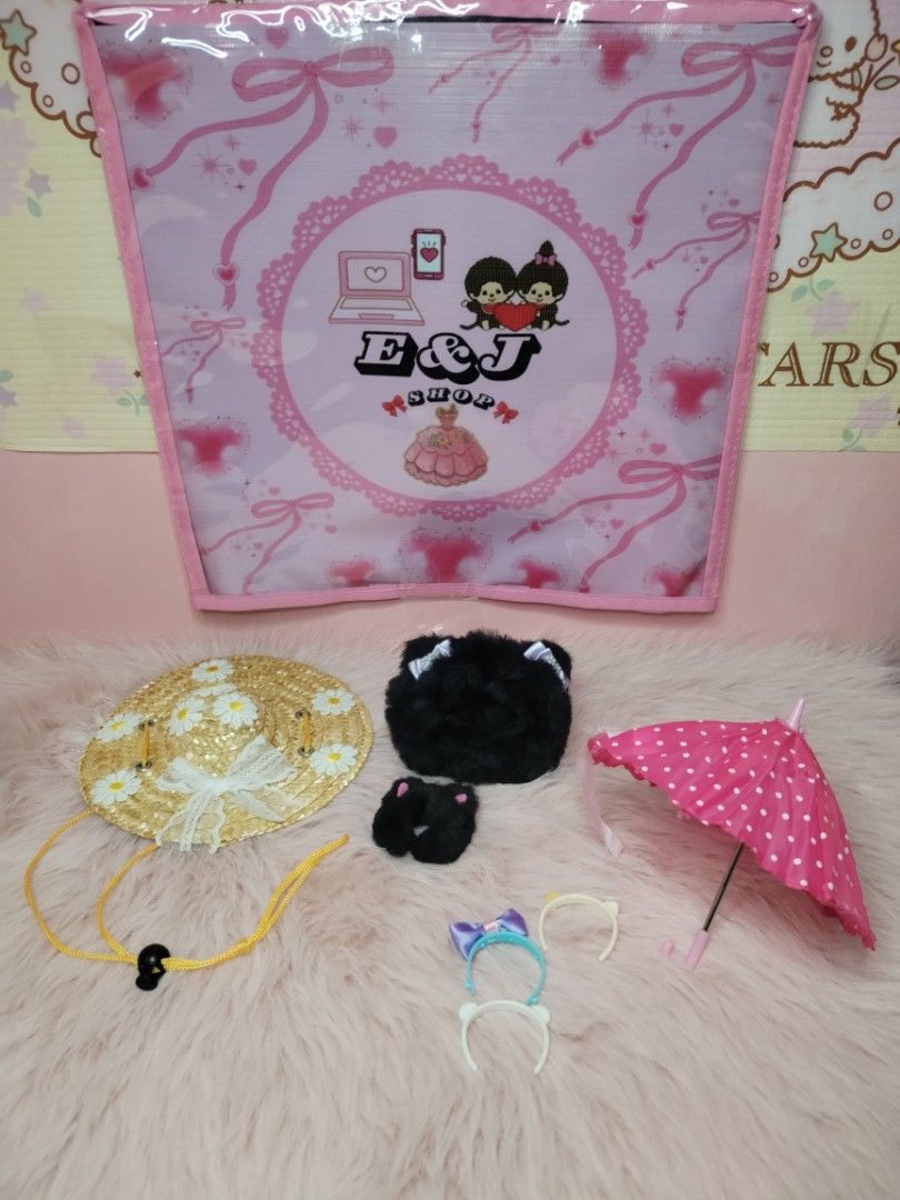Doll accessories set, straw hat, pink umbrella, headbands (Category: Kids Toys) located in Paombong. Submitted by eandj.shop (Listing ID 1466040649, Image 1). Description: 🎀 Adorable mini accessory bundle for collectible plush toys and dolls 🎀 Includes daisy straw hat with a yellow chin strap 🎀 Fluffy black plush bag/hat piece and small black plush accessory 🎀 Charming pink polka dot miniature umbrella 🎀 Set of three tiny headbands in assort