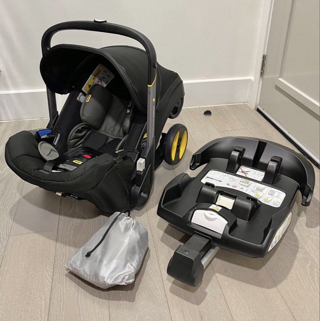 Doona+ Infant Car Seat and Stroller with Base (Category: Strollers) located in Makati City. Submitted by meddr_ (Listing ID 1466028238, Image 1). Description: - Authentic Doona+ infant car seat and stroller combo in black with grey inserts and yellow wheel accents - Instantly transforms from car seat to stroller in just seconds - No need to carry a heavy car seat—ideal for parents on the go - Includes vehicle base and original silver dust bag - C