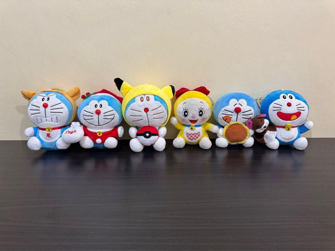Doraemon plush toy - Mascot Size (Category: Plushies & Soft Toys) located in Cainta. Submitted by mayhroeen (Listing ID 1466015510, Image 1). Description: - Authentic Doraemon plush toys - Available designs: Christmas outfit, Pikachu hoodie, Year of the Horse, Dorayaki snacking, and mouse companion - Super soft plush material with high-quality embroidered details - Price is for 1 piece only (collect the whole set!) - Kindly PM us to check stock a