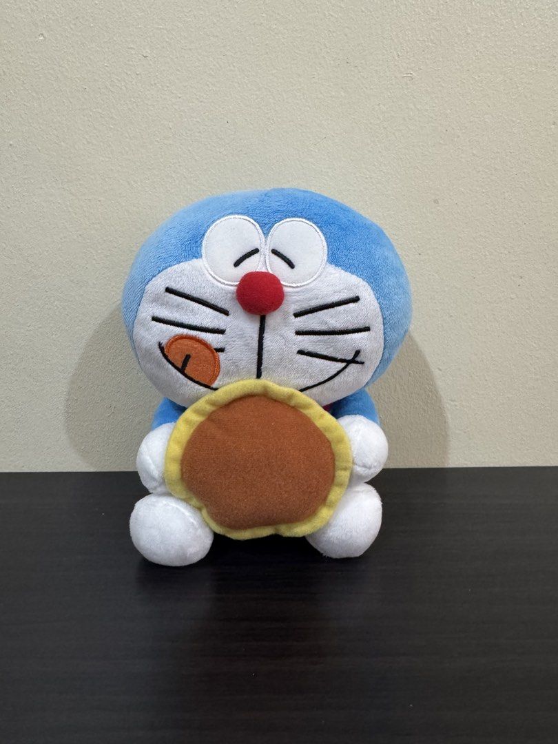 Doraemon plush toy - Mascot Size (Category: Plushies & Soft Toys) located in Cainta. Submitted by mayhroeen (Listing ID 1466015510, Image 3). Description: - Authentic Doraemon plush toys - Available designs: Christmas outfit, Pikachu hoodie, Year of the Horse, Dorayaki snacking, and mouse companion - Super soft plush material with high-quality embroidered details - Price is for 1 piece only (collect the whole set!) - Kindly PM us to check stock a