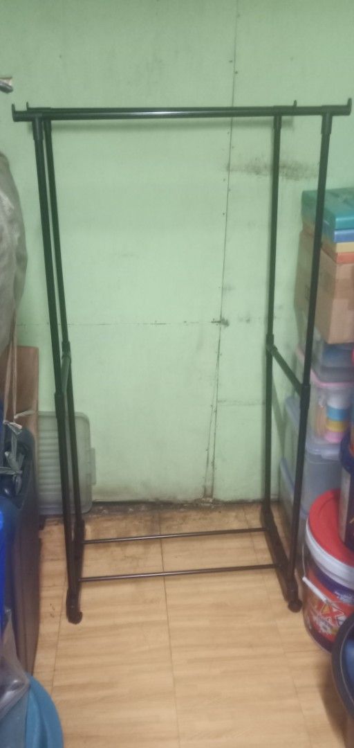 Double-Pole Telescopic Clothes Rack (Category: Clothes Drying Rack) located in Manila. Submitted by jenn0825 (Listing ID 1466104030, Image 2). Description: - Color: black - Material: steel pipe and plastic - Capacity: Supports up to 30kg - Adjustable:Approx. 65cm (L) x 38cm (W) x 120-130cm (H) - Assembly: Simple, tool-free setup - Condition: Complete with original box and all parts -Contact Nos.09281849648/09752392128.