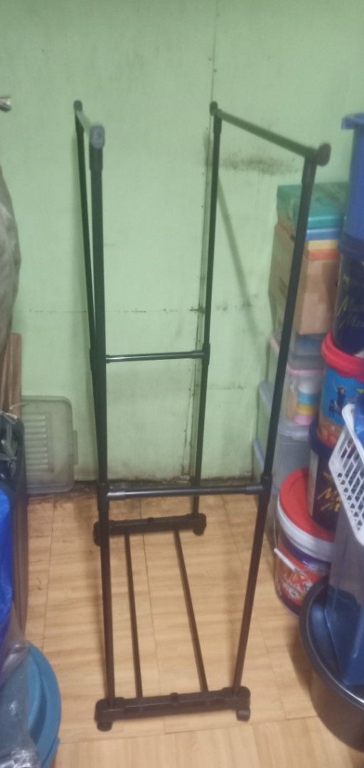 Double-Pole Telescopic Clothes Rack (Category: Clothes Drying Rack) located in Manila. Submitted by jenn0825 (Listing ID 1466104030, Image 1). Description: - Color: black - Material: steel pipe and plastic - Capacity: Supports up to 30kg - Adjustable:Approx. 65cm (L) x 38cm (W) x 120-130cm (H) - Assembly: Simple, tool-free setup - Condition: Complete with original box and all parts -Contact Nos.09281849648/09752392128.