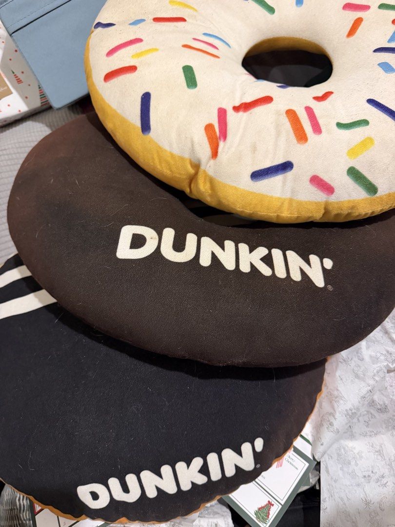 Dunkin Donuts Cushion Pillow Bundle Set (Category: Bedding & Towels) located in Baguio. Submitted by ernest2232 (Listing ID 1466107852, Image 1). Description: - Bundle set of 3 fun donut novelty pillows Issues Choco- Discoloration Sprinkles- needs wash Bavarian- discoloration and needs stitching.