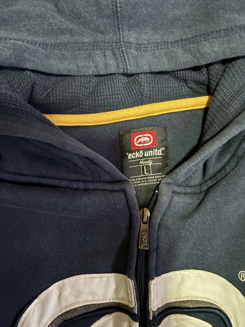 Ecko Untld full-zip hoodie (Category: Coats, Jackets and Outerwear) located in Caloocan City. Submitted by worthysupplies-83215 (Listing ID 1466076200, Image 2). Description: vintage navy blue full-zip hoodie from Ecko Unltd. Good Condition (8/10) length: 29 inches width: 25 inches sleeve length: 25 inches ₱1,199 + shipping 📍North Caloocan.