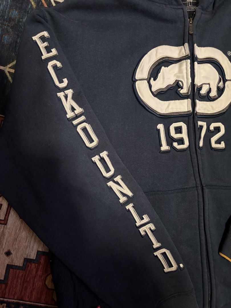 Ecko Untld full-zip hoodie (Category: Coats, Jackets and Outerwear) located in Caloocan City. Submitted by worthysupplies-83215 (Listing ID 1466076200, Image 3). Description: vintage navy blue full-zip hoodie from Ecko Unltd. Good Condition (8/10) length: 29 inches width: 25 inches sleeve length: 25 inches ₱1,199 + shipping 📍North Caloocan.