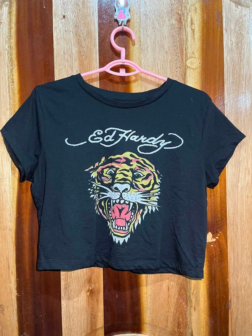 ED HARDY CLASSIC LION GRAPHIC TEE (Category: Blouses) located in Sindangan. Submitted by waterbop (Listing ID 1466138509, Image 1). Description: 450 + SF - EXCELLENT CONDITION - NO ISSUE - 10/10 COLOR RATE - 19W - 18L - XL on tag LOC ZAMBOANGA.