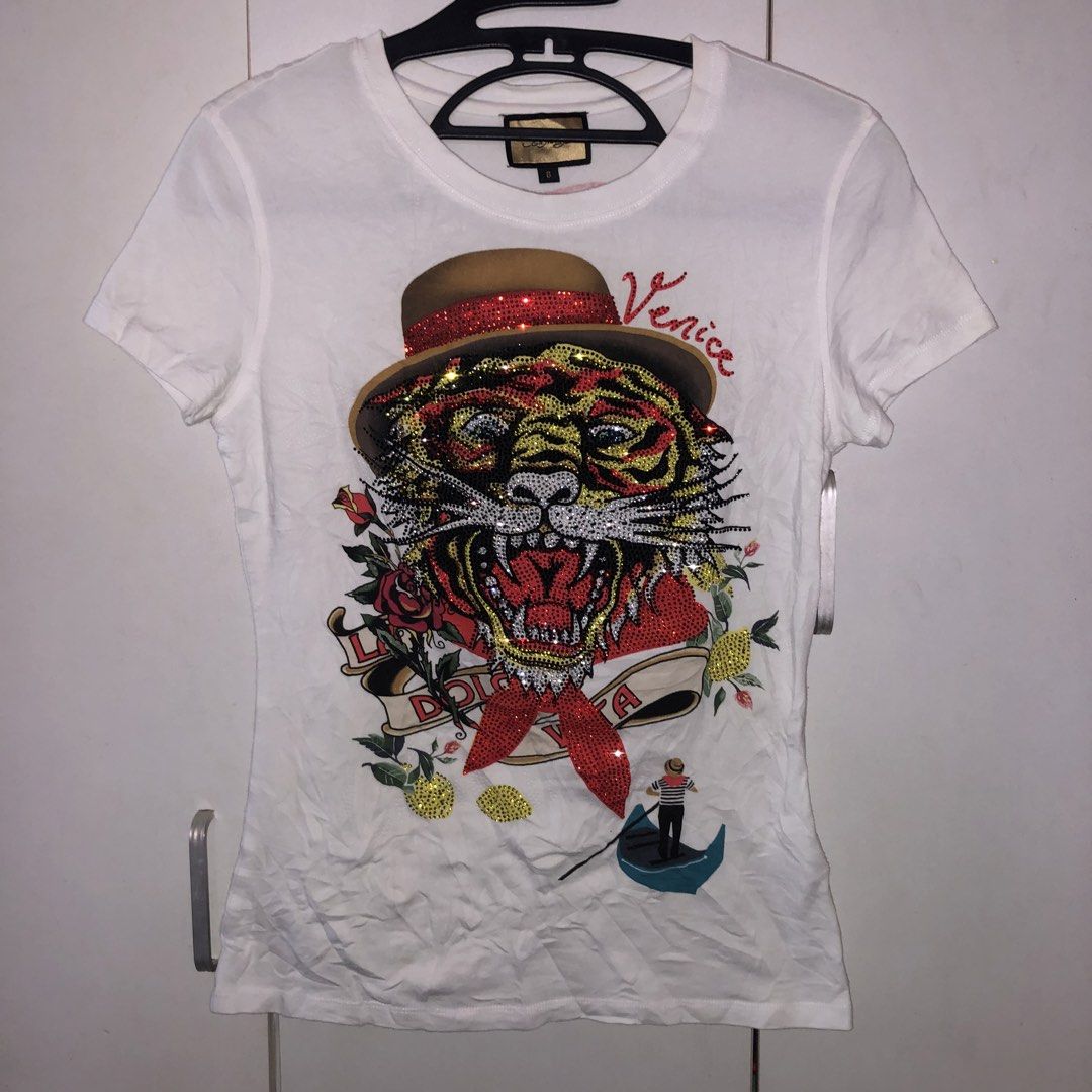 Ed hardy Y2K shirt (Category: Shirts) located in Manila. Submitted by pitogoline94751 (Listing ID 1466047040, Image 1). Description: Ed Hardy Y2K womens shirt Excellent Condition No Issue Size small.