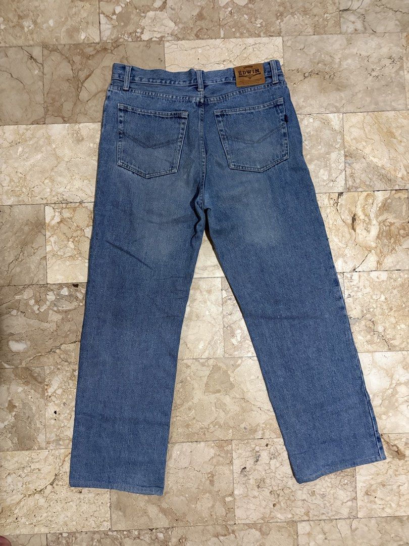 Edwin | Light Wash Denim Jeans (Category: Jeans) located in Antipolo. Submitted by gabbiep. (Listing ID 1466043650, Image 2). Description: Edwin Jeans | Light Wash Straight Jeans - Wash: Mid blue - Fit: Straight fit - Design: Traditional 5-pocket layout with contrast stitching - Details: Genuine leather back patch and signature red coin pocket tag - Location: Antipolo, Rizal/Los Baños, Laguna Waist: 34 inches (on tag) Length: 41.8 inches Leg open