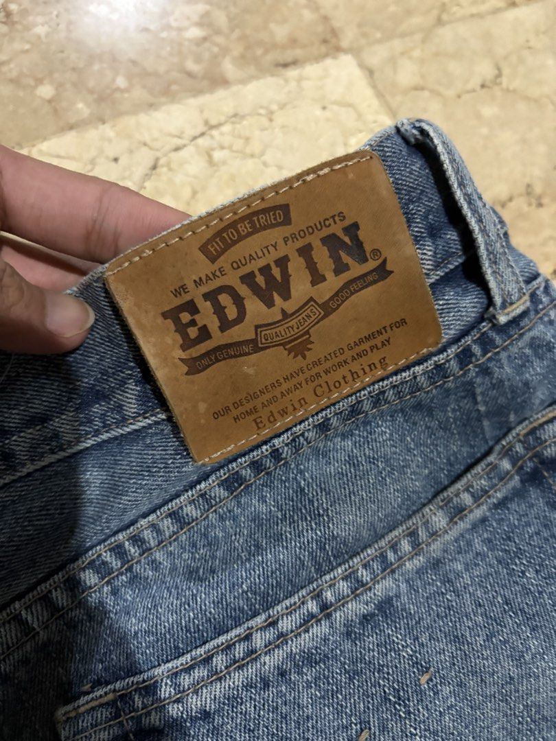 Edwin | Light Wash Denim Jeans (Category: Jeans) located in Antipolo. Submitted by gabbiep. (Listing ID 1466043650, Image 3). Description: Edwin Jeans | Light Wash Straight Jeans - Wash: Mid blue - Fit: Straight fit - Design: Traditional 5-pocket layout with contrast stitching - Details: Genuine leather back patch and signature red coin pocket tag - Location: Antipolo, Rizal/Los Baños, Laguna Waist: 34 inches (on tag) Length: 41.8 inches Leg open