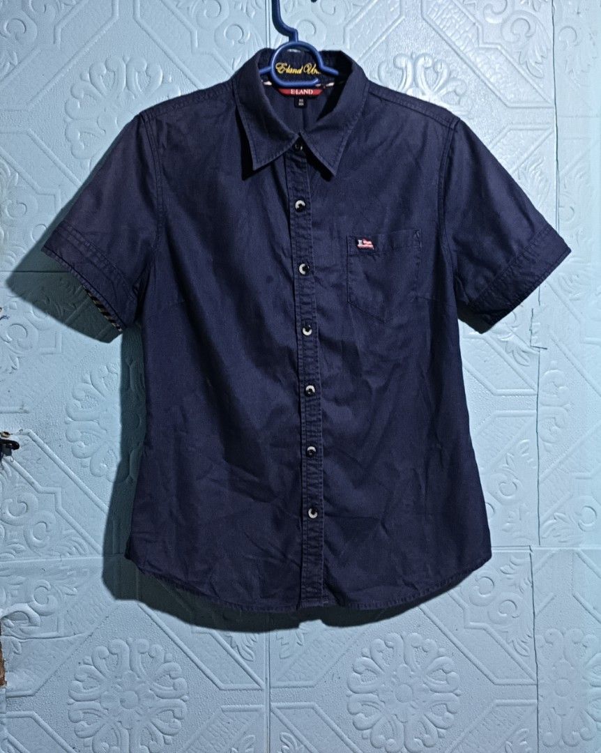 ELAND POLO DARK BLUE SHORT SLEEVE (Category: Activewear) located in Quezon City. Submitted by zoesmithshop (Listing ID 1466079338, Image 1). Description: DARK BLUE POLO FOR WOMEN SIZE-SMALL BRAND -ELAND.