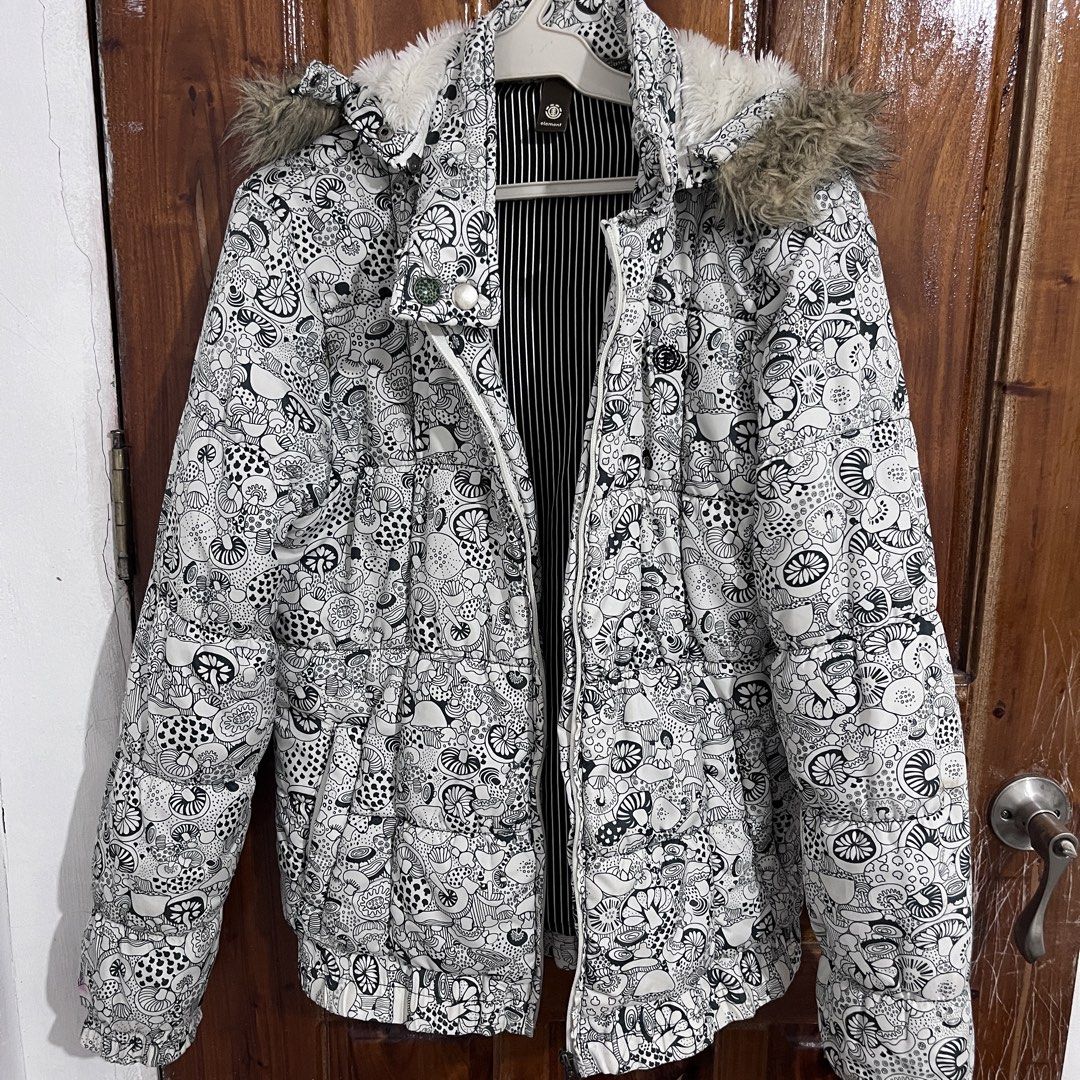 Element Black and White Mushroom Print Puffer Jacket (Category: Coats, Jackets and Outerwear) located in Baguio. Submitted by gbwardrobe (Listing ID 1466021580, Image 1). Description: - Brand: Element - Design: All-over black and white mushroom and doodle print with a stylish striped inner lining - Hood: Attached hood featuring a cozy, fluffy faux fur trim - Closure & Warmth: Full front zip closure, thick winter padding, plus ribbed hem and cuffs
