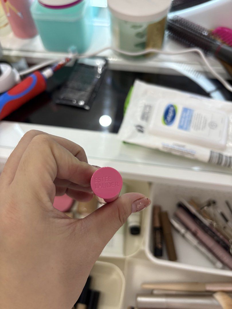 Estee Lauder lipstick (Category: Makeup) located in Manila. Submitted by monstershaaa (Listing ID 1466125579, Image 3). Description: - Vibrant bright pink lipstick tube with an elegant gold metallic ring - Smooth and durable plastic casing - Standard-sized container that fits easily in any makeup bag or purse - Perfect for hassle-free daily touch-ups anywhere you go.
