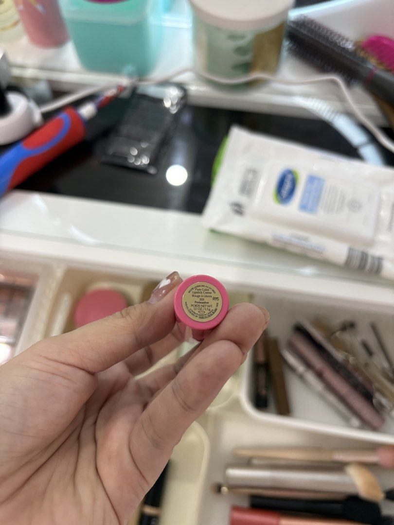Estee Lauder lipstick (Category: Makeup) located in Manila. Submitted by monstershaaa (Listing ID 1466125579, Image 2). Description: - Vibrant bright pink lipstick tube with an elegant gold metallic ring - Smooth and durable plastic casing - Standard-sized container that fits easily in any makeup bag or purse - Perfect for hassle-free daily touch-ups anywhere you go.