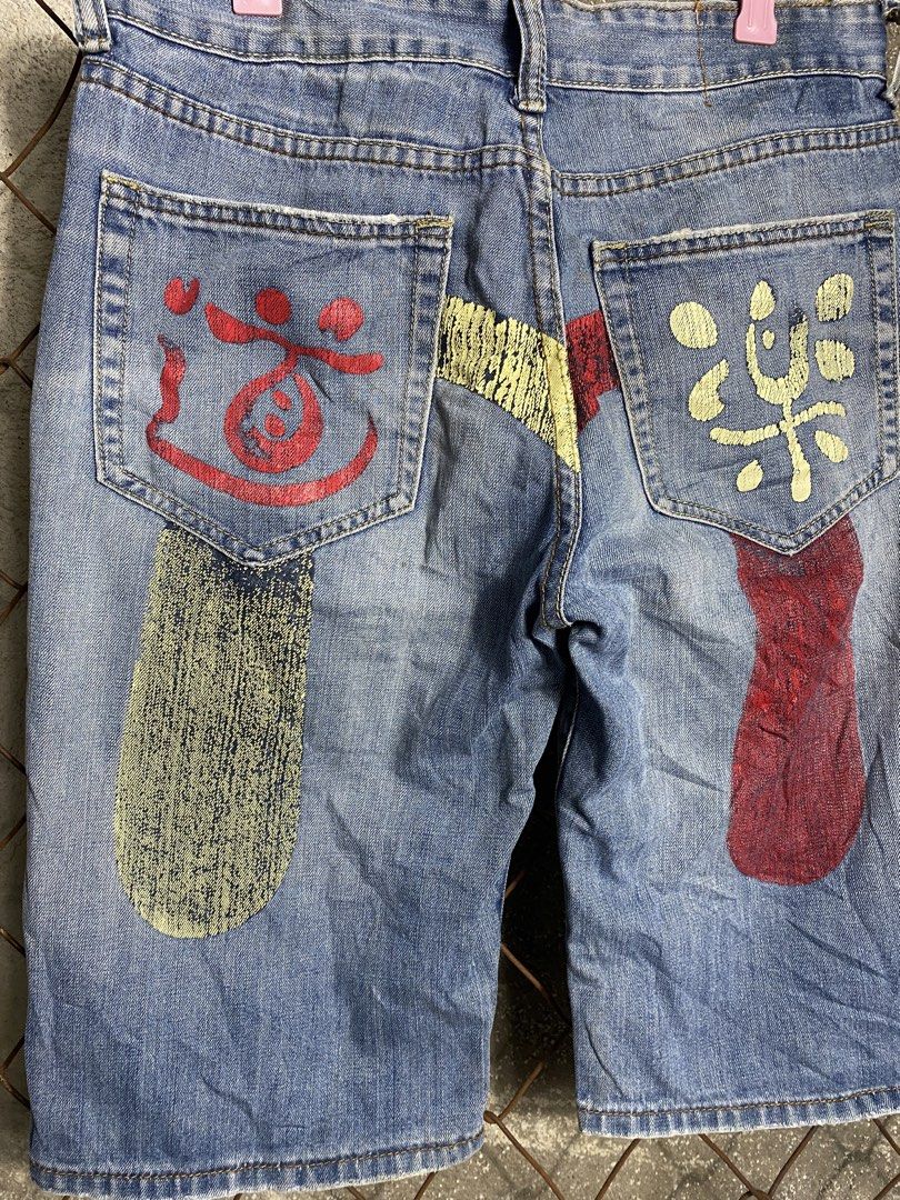 Evisu Custom Painted Denim Shorts (Category: Shorts) located in Cabanatuan. Submitted by brightwater-2083 (Listing ID 1466072412, Image 2). Description: - Brand: Evisu - Style: Custom painted light wash denim shorts (jorts) - Details: Vibrant graphic artwork on back pockets and legs, branded metal hardware, and contrast stitching - Finish: Trendy raw hem details - Vibe: Perfect for streetwear, skating, and casual daily wear - Condition: Brand new