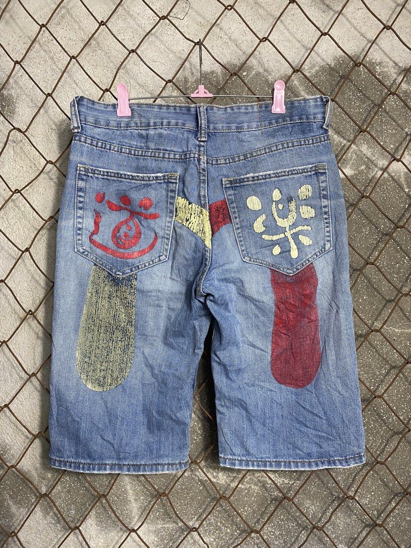 Evisu Custom Painted Denim Shorts (Category: Shorts) located in Cabanatuan. Submitted by brightwater-2083 (Listing ID 1466072412, Image 1). Description: - Brand: Evisu - Style: Custom painted light wash denim shorts (jorts) - Details: Vibrant graphic artwork on back pockets and legs, branded metal hardware, and contrast stitching - Finish: Trendy raw hem details - Vibe: Perfect for streetwear, skating, and casual daily wear - Condition: Brand new