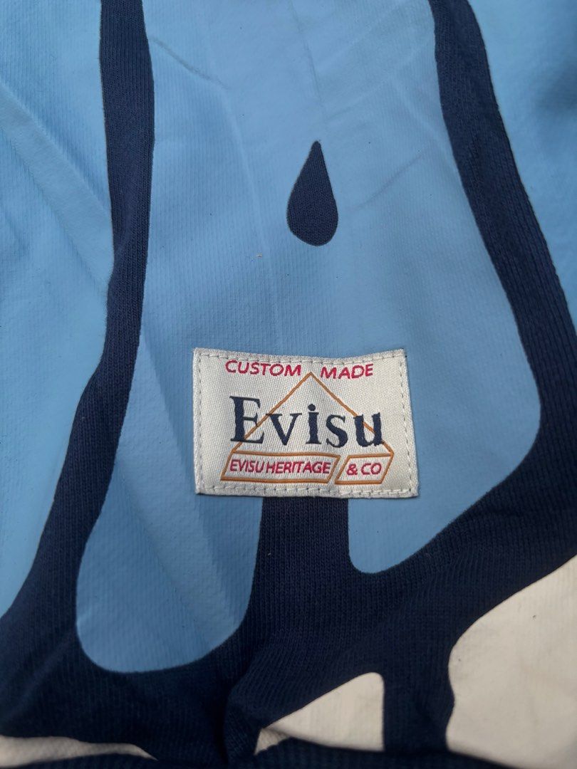 EVISU FW22 AOP Wave Pattern Letter Print Pullover Sweatshirt (Category: Coats, Jackets and Outerwear) located in Caloocan City. Submitted by neweagle-424b (Listing ID 1466105323, Image 2). Description: Dimes : W 26 x 26 L boxy type excellent condition ✅ novaliches qc metro manila dm not thrifted gift to japan made .